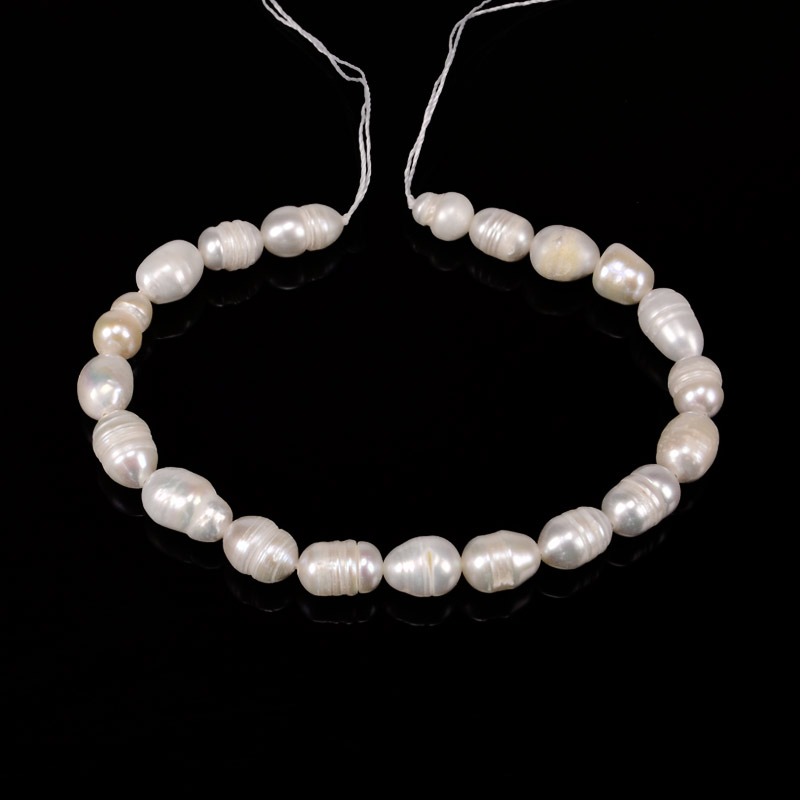 Бусины Жемчуг речной натуральный молочный, Рис, 6-7х8-10 мм (18 см) (BUS-053734)