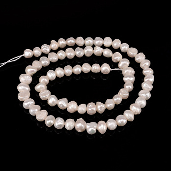 Намистини Перли річкові натуральні, Молочний, 5-6х3,5-4,5 мм (37 см) (BUS-049684)